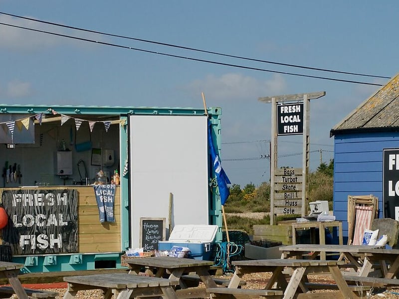 Dungeness Snack Shack is located in Dungeness, Kent. The Good Food Guide says: “ Here you'll discover a fishmongers and the weather-dependent Snack Shack – a 'fantastic find' serving cooked-to-order seafood from a hatch, to be eaten at picnic benches on the shingle.”